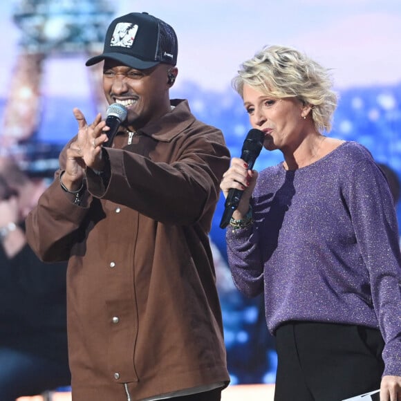 Soprano, Sophie Davant et Nagui - 36ème Edition du Téléthon à Paris. Le 2 décembre 2022 © Coadic Guirec / Bestimage  