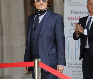 Johnny Depp et Amber Heard à la cour de justice à Londres dans le cadre du procès contre le journal The Sun, le 14 juillet 2020. 