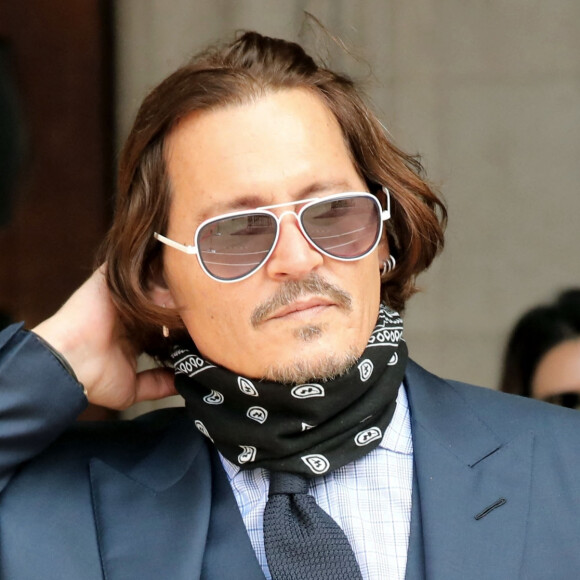 Info du 6 novembre 2020 - Johnny Depp annonce après avoir perdu son procès et à la demande de Warner Bros, qu'il ne participera pas au prochain opus 'Les Animaux Fantastiques' - Info - Johnny Depp, décrit en mari violent par le Sun, perd son procès en diffamation - Johnny Depp et Amber Heard à la cour de justice à Londres dans le cadre du procès contre le journal The Sun le 14 juillet 2020. 