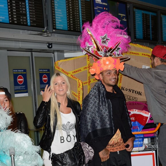 Jessica et Julien de retour a Paris apres le tournage de l'emission 'Les Marseillais a Rio' pour W9, le 06 mars 2014, a l'aeroport Roissy Charles de Gaulle, Paris. Photo by Nicolas Briquet/ABACAPRESS.COM