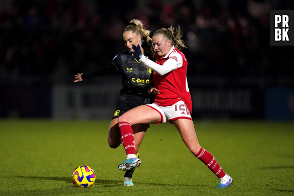 Aston Villa's Alisha Lehmann (left) and Arsenal's Frida Maanum battle for the ball during the FA Women's Continental League Cup Quarter-Final match at Meadow Park, London. Picture date: Thursday January 26, 2023. ... Arsenal v Aston Villa - FA Women's Continental League Cup - Quarter-Final - Meadow Park ... 26-01-2023 ... London ... UK ... Photo credit should read: John Walton/PA Wire. Unique Reference No. 70739898 ... See PA story SOCCER Arsenal Women. Photo credit should read: John Walton/PA Wire. RESTRICTIONS: Use subject to restrictions. Editorial use only, no commercial use without prior consent from rights holder. 
