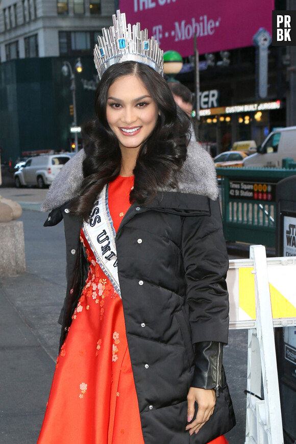 Pia Wurtzbach Miss Universe 2015 looks amazing in a bright red dress with her Miss Universe sash and crown on her head as she leaves the Kelly and Michael show, New York City, NY, USA on January 4, 2016. Photo by GSI/ABACAPRESS.COM