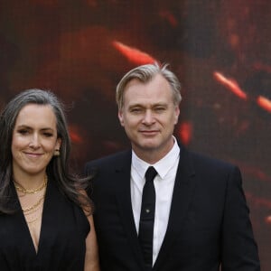 London, UNITED KINGDOM - Cast walk the 'charred' black carpet at tonight's premiere Pictured: Christopher Nolan