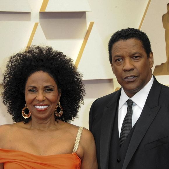 Pauletta Washington, Denzel Washington au photocall de la 94ème édition de la cérémonie des Oscars à Los Angeles, le 27 mars 2022. 
