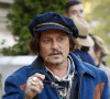 Johnny Depp reçu par le Président serbe Aleksandar Vucic à l'occasion de la première série animée "Puffins" produite en Serbie. Le 19 octobre 2021.