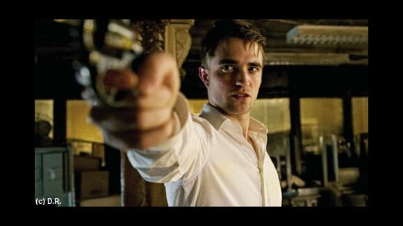 Robert Pattinson : l’arme à la main dans Cosmopolis (PHOTOS)