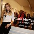 Clara Morgane sexy pour le lancement de son calendrier 2014