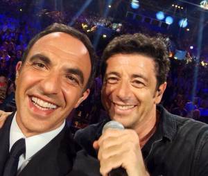 Nikos Aliagas et Patrick Bruel lors de la soirée La Chanson de l'année 2014, le 14 juin sur TF1