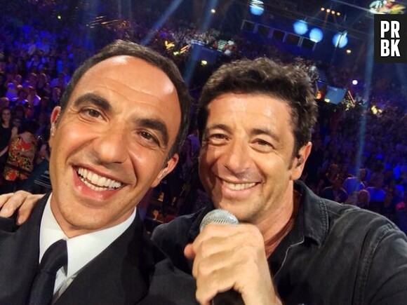 Nikos Aliagas et Patrick Bruel lors de la soirée La Chanson de l'année 2014, le 14 juin sur TF1