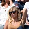 Enora Malagré profite du soleil dans les tribunes de Roland Garros, le samedi 31 mai 2014