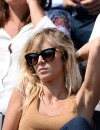  Enora Malagr&eacute; profite du soleil dans les tribunes de Roland Garros, le samedi 31 mai 2014 