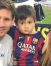 Lionel Messi, Thiago et Antonella fêtent la victoire du FC Barcelone en Liga le 23 mai 2015 au stade Camp Nour à Barcelone