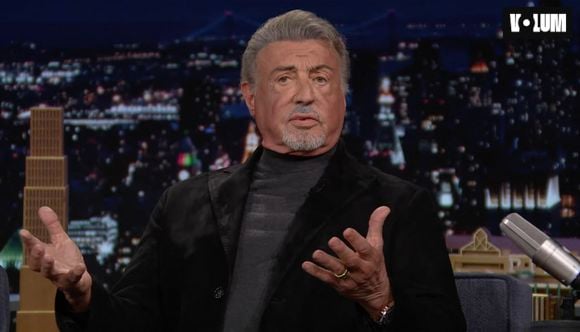 Pictures MUST credit: NBC
Sylvester Stallone has told how he changed the ending of breakthrough movie Rocky to leave audiences on a high.
Stallone, 80, who wrote the screenplay, said the film’s budget had been exhausted when he realised the original ending was too much of a downer.
It tells the story of an uneducated, working-class debt collector and part-time club boxer from Philadelphia who is unexpectedly given a once-in-a-lifetime shot to fight the world heavyweight champion.
The film ends after the fight climax.
Speaking on the Tonight Show Starring Jimmy Fallon, to promote his new autobiography titled The Steps, he said of the previous ending: “It's really interesting because at the very end, Rocky walks out and he's with Adrian and there's trash everywhere.
“People have seen the fight and had gone home and they're basically forgotten.
“Like 10 minutes later that moment passed and I was like, ‘This is kind of depressing. My God, wow.’ “Actually, the picture on the poster is that scene we're talking about, which is not even in the movie. “I begged the producer. I said, ‘We got to end on a high note.’ “He said, ‘We have no money.’ I said, ‘Well, we'll figure it out.’
“ We went out, went around, asked a few friends.
“Got about 12 people (as extras) and we couldn't even build a ring. We built maybe 10 feet. It's plywood and the ropes are sagging.
“We're like holding the ropes up. And then we just said, ‘Keep walking in a circle. Walk in a circle, walk in a circle.’ “And Rocky's, ‘Yo, get that thing out of my face.’ “And then Adrian comes in the ring and he goes, ‘Where's your hat?’ “And I went, ‘there it is’. “He doesn't care about the fight. He just cares about falling in love.
“And the music swells and they kiss.
"That was the peak of their life so I wanted to freeze on that second.” Picture supplied by JLPPA | 00771978