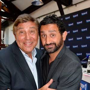 Jean-Pierre Foucault et Cyril Hanouna - Conférence de rentrée de Europe 1 à Paris. Le 3 septembre 2014