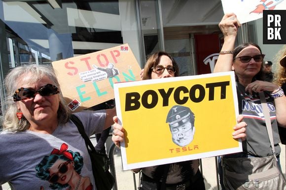 March 29, 2025, Manhattan, New York, USA: New York, New York March 29.2025.. Rise and Resist NYC protestors shutdown Manhattan Tesla showroom in act of defiance against Elon Musk and Donald Trump. (Credit Image: © Bruce Cotler/ZUMA Press Wire)