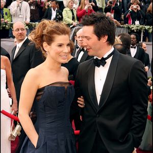 KEANU REEVES ET SANDRA BULLOCK  - ARRIVEES A LA CEREMONIE DES OSCARS 2006