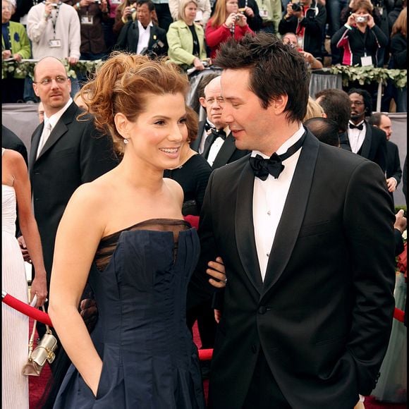 KEANU REEVES ET SANDRA BULLOCK  - ARRIVEES A LA CEREMONIE DES OSCARS 2006
