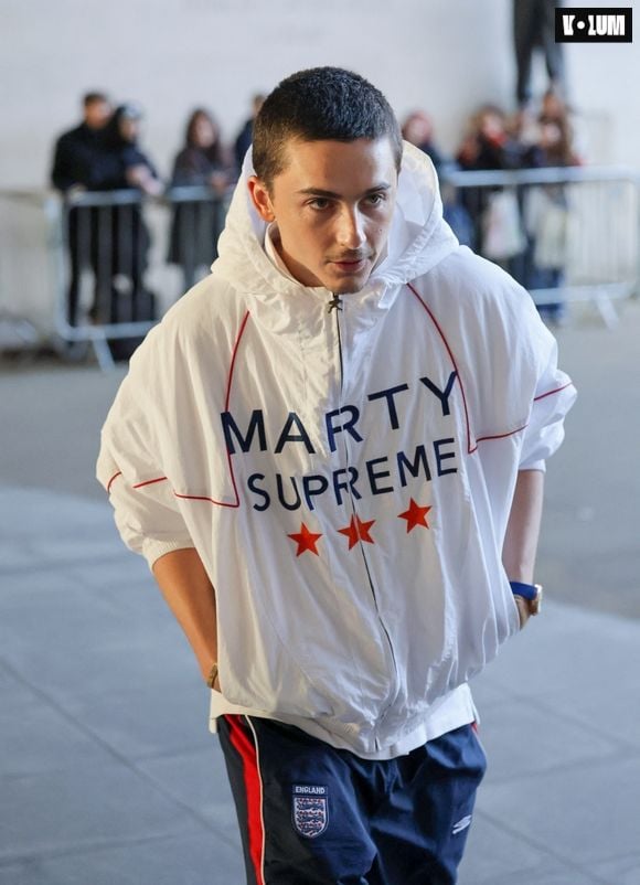 BGUK_3439062 - London, UNITED KINGDOM  Timothée Chalamet is seen arriving at the BBC studios in London, catching attention in a bold England tracksuit and statement white Marty Supreme jacket. The actor drew a crowd as he stepped out in the sporty look ahead of his scheduled appearance.



Pictured: Timothée Chalamet